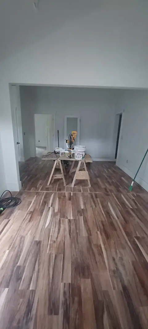 Hardwood-style flooring installed in an open living area, Kings Mountain Tile project in North Carolina