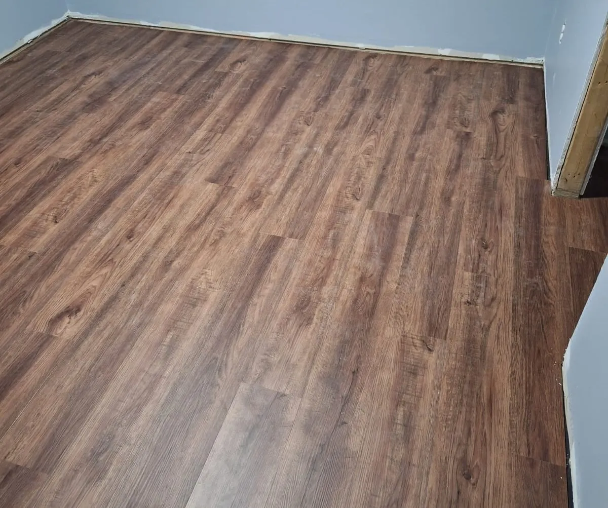 Luxury vinyl plank flooring installed in a living space